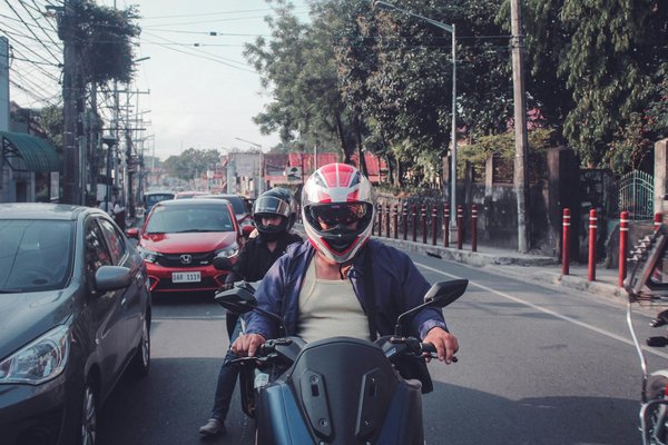 How can you effectively clean and maintain your motorcycle's chain?